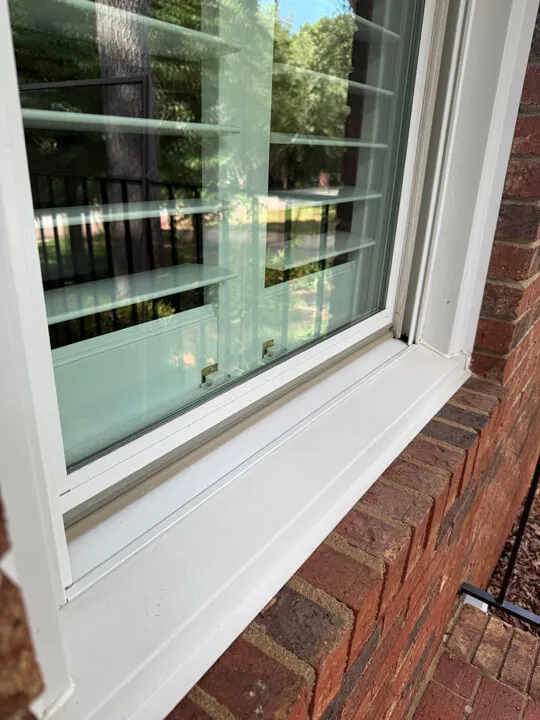 Clean exterior windows after professional washing