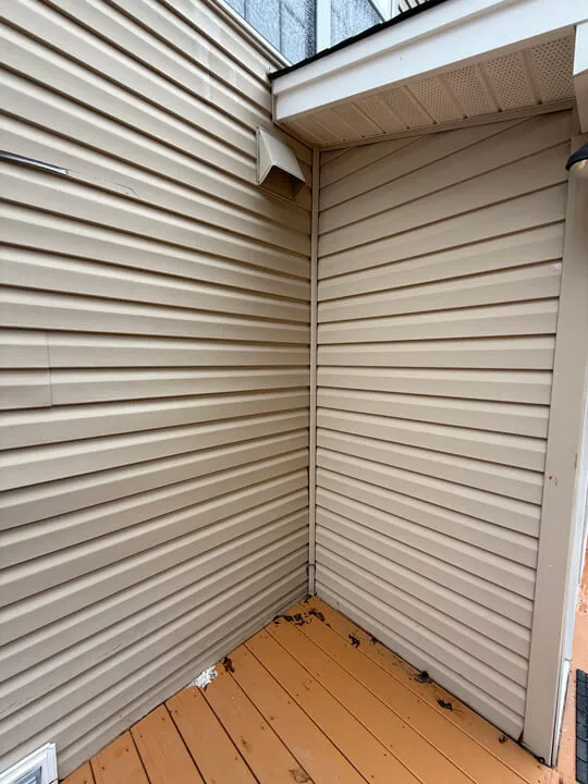 Detailed exterior cleaning result on a home